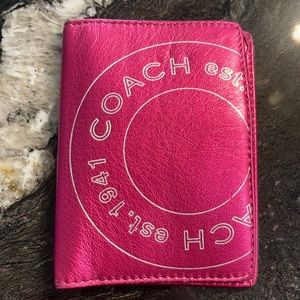 Pink, coach passport card holder.